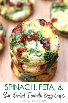 spinach, feta and sun dried tomato egg cups are stacked on top of each other