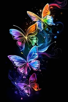 three colorful butterflies flying in the air with swirls and bubbles around them on a black background