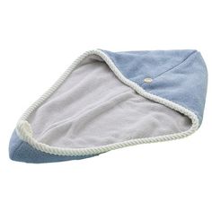 a blue and white dog bed with a corded edge