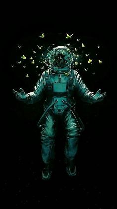 an astronaut in the dark with butterflies flying around him and his hands out to each other