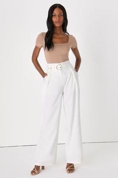 From the conference room to dinner with besties, strut your stuff in the Lulus Confident Vibes White Belted Wide-Leg Trouser Pants! Theses chic pants have a woven fabric construction that shapes a high-waisted fit, top clasp and hidden zip-fly, and a matching detachable belt (with round, shiny gold buckle). Relaxed, wide-cut pants, with light seaming from the waist, feature diagonal pockets before ending at ankle-length hems. Fit: This garment fits true to size. Length: Floor length. Size medium Inseam: 31.00 Front Rise: 11.75 Waist: Fitted - very fitted at natural waist. Hip: Loosely Fitted. Fabric: Fabric has no stretch. Lined. Shell: 72% Polyester, 25% Rayon, 3% Spandex. Lining: 97% Polyester, 3% Spandex. Hand Wash Cold. Do Not Bleach. Line Dry. Iron Low Heat. Imported. Lulus | Confiden Tops On White Pants, Feminine Outfits With Pants, Elegant Slim Fit Pants For Brunch, Elegant High Waist Pants For Brunch, Chic Wide Leg Pants For Brunch, Chic High Waist Bottoms For Brunch, Chic High-waist Bottoms For Brunch, Chic High-waisted Pants For Brunch, Fitted High-waisted Pants For Brunch