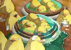 some yellow ducks are in a bucket and one is on the floor next to another