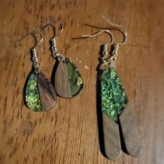 Nwt, 2 Pairs Of Classy Earrings. Made Of Wood & Green Resin With Gold Flakes. 1 Teardrop Pair & 1 Longer Dangle Pair. Great Gift!! Teardrop Resin Jewelry, Epoxy Earrings, Resin Teardrop Earrings, Tear Drop Resin Earrings, Hand Painted Green Resin Earrings, Green Resin Drop Earrings, Classy Earrings, Wood Resin Jewelry, Diy Resin Projects