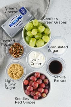 grapes, yogurt, granola, and other ingredients are arranged in separate bowls