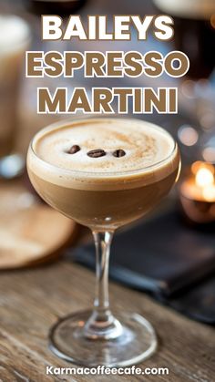 a close up of a drink in a glass with the words bailey's espresso martini