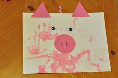 a handprinted pig on a piece of paper