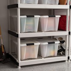 the shelves are filled with different types of plastic containers