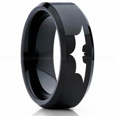 batman symbol black ceramic ring on white background