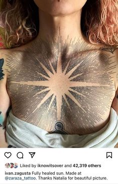 a woman with tattoos on her chest