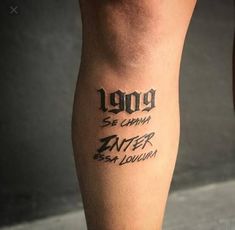 a person with a tattoo on their leg that reads, long live the captain and never sit