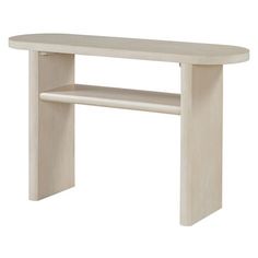 a white wooden table with shelves underneath it