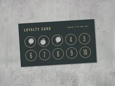 a black and gold business card with numbers on it that says, lovablely card