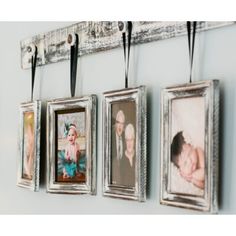 four framed photos hang on a wall