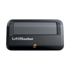 the liftmaster button is shown in black and white, with an orange light on it