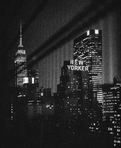 black and white photograph of new york city at night