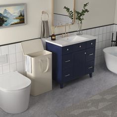 a bathroom with two sinks, a toilet and a bathtub next to each other