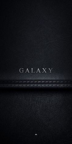 the back side of a black leather case with an inscription on it that reads galaxy