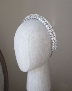 Simulated dimaonds add a never-seen-before sparkle to this delicate bridal headpiece | Wedding, wedding inspiration, wedding looks, bridal outfits, wedding hairstyles, wedding hair bride, wedding hair accessories, bridal hair accessories, bride hairstyle, bridal hair ideas, bridal hairstyles, romantic bride, romantic wedding, sparkly headband, bridal headband, bridal tiara, bridal headpiece, luxury wedding, glam bridal hair, hair accessories for brides #weddinghair #bridetobe Halo Tiara, Hair Clips Bridal, Floral Headband Wedding, Demetrios Bridal, Wedding Tiara Veil, Royal Bride, Bridal Runway, Flower Headband Wedding, Diamond Headband