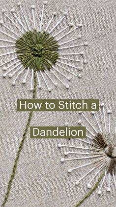 two dandelions on a piece of fabric with needles in the shape of hearts