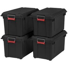 three black storage containers with red handles