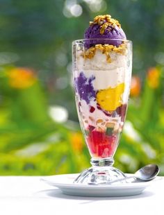 an ice cream sundae in a glass on a table