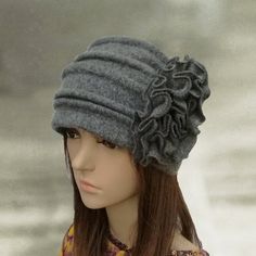 This  gray  felted beanie is super warm.This hat is very comfortable and easy to wear.  You can put it on with classic and casual style clothing, so this beautiful cap is very universal. Composition: 100% wool It is a very stylish women's beanie that is going to keep you warm in cold days, yet you will look amazing.  This headpiece is a timeless classic and great for all ages. Boiled wool is thin, you can fold the hat and slip in into your bag.One size to fit average woman's head.CARE: Hand wash Womens Winter Hats, Womens Beanie, Black Wool Hat, Warm Hats, Wool Hats, Felt Wool, Warm Winter Hats, Wool Berets, Altering Clothes