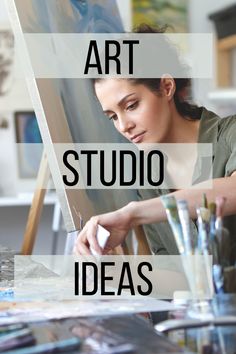 a woman is painting with the words art studio ideas