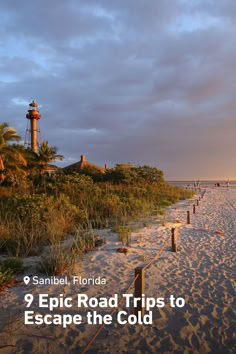 a sandy beach next to the ocean with a light house in the background and text that reads, 9 epic road trips to escape the cold