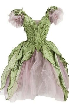 a dress on a mannequin with pink and green tulle around the skirt