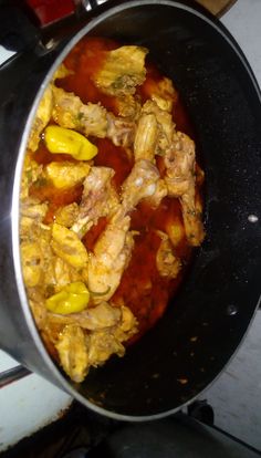 the food is prepared and ready to be cooked in the pot on the stove top