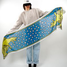 Two hands reach from the ether, surrounded by stars in "Mystic". Magical yellows and vibrant blues make this scarf pop! Conjure up a stunning outfit with this sorcerous scarf.  Inspiration: Ilsée : Princesse de Tripoli, 1897 - Soft cotton blend - Fan favorite 72" x 18" size - Versatile styling options - Timeless book-inspired design - Perfect for all-season wear Scarf Inspiration, Star Scarf, Yellow Accessories, 2024 Style, Bold Accessories, Church Design, Stunning Outfits, Elegant Accessories, Blue And Yellow