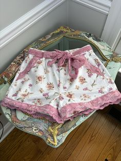 I love the white floral with the pink lace and I gave it a matching belt for you to configure to the style of your choice or simply go with out it. 

These are pre-owned, up-cycled shorts.  

Wash in cold and lay flat to dry, light iron on the lace.

Size US 8

Inseam 3"

Waist 28", High Waist

Top of belt to bottom lace is 13"

4 functional pockets Lace Shorts Outfit, Lace Short Outfits, Lace Belt, Boutique Couture, Handmade Jewelry Bracelets, Nighty Night, Glass Bottle Crafts, Shorts Outfit, Handmade Boho