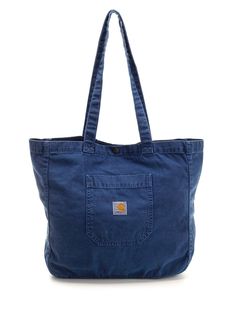 Faded blue cotton twill "Garrison Tote" bag from Carhartt WIP, with an internal zip pocket, snap button closure and external pocket with square fabric label. Tote Bag For Men, Square Fabric, Fabric Labels, Carhartt Wip, Fabric Squares, Wallet Bag, Cool Socks, Small Leather Goods, Lace Boots