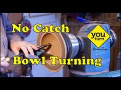 a man is working on a machine with the words no catch bowl turning