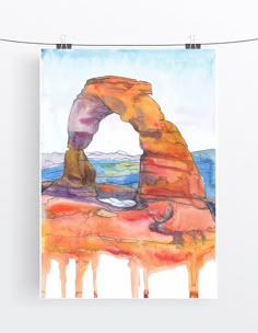 a watercolor painting of a rock formation in the middle of an orange and blue landscape