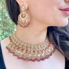 Featuring a traditional bridal jaal necklace made in 22ct gold. The necklace weighs 81.91 GMs including 12.49 GMs of hanging beads. The earrings weigh 23.50 GMs including 3.24 GMs of hanging beads. Ceremonial 22k Gold Meenakari Jewelry, Yellow Gold Round Temple Necklace With Meenakari, 22k Yellow Gold Chandbali Kundan Necklace, 22k Gold Temple Necklace With Meenakari, 22k Yellow Gold Kundan Necklace With Meenakari, 22k Gold Meenakari Chandbali Jewelry Sets, 22k Gold Round Kundan Temple Jewelry Necklace, 22k Gold Round Temple Necklace With Meenakari, 22k Gold Chandbali Temple Necklace For Celebration