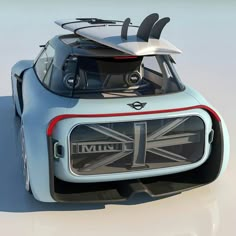 an electric car with surfboards strapped to the roof is shown in this rendering image