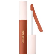 A weightless air-whipped lip cream that hugs lips with rich color and nourishing hydration that gives a soft velvety matte finish.Formulation type: Liquid lipstick Benefits: HydratingIngredient Callouts: Free of sulfates SLS and SLES, parabens, formaldehydes, formaldehyde-releasing agents, phthalates, mineral oil, retinyl palmitate, oxybenzone, coal tar, hydroquinone, triclosan, and triclocarban, and contains less than one percent of synthetic fragrances. This product is also vegan and cruelty-f Rare Beauty Lipstick, Rare Beauty Lip, Selena Gomez Lips, Perfect Nude Lipstick, Rare Beauty By Selena Gomez, Purple Lipstick, Matte Lip Cream, Cream Lipstick, Beauty Lipstick