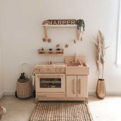 The Milton & Goose Essential Play Kitchen in natural sits in a play space filled with natural light. Play Kitchen Accessories, Wooden Play Kitchen, Magnolia Baby, Bow Shop, Learn Crafts, Musical Toys, Holiday Books, Play Kitchen, Rattles