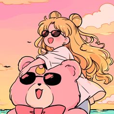 a woman in sunglasses is holding a pink teddy bear on the beach while wearing shades