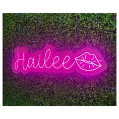 a neon sign that says'halee'with lips and tongues on it