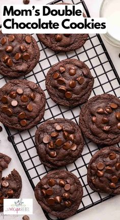 chocolate cookies on a cooling rack with the words mom's double chocolate cookies above it