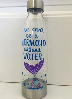 a water bottle with an image of a mermaid on the front and words that read, you can't be a mermaid without water