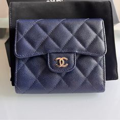 Chanel Trifold Compact Flap Wallet Caviar Navy Shw Made In Spain Excellent Used Brand New Condition In Mint (Pristine) No Flaws To Report Includes Everything: Dust Bag, Box And Authentication Card No Signs Of Wear And Tear. Length: 4.5 In Width: 0.5 In Height: 4 In Open For Offers But No Lowballing Please Happy Shopping Ladies!! Chanel Flap Wallet, Luxury Blue Wallet For Formal Occasions, Designer Blue Wallet For Formal Occasions, Designer Blue Wallets For Formal Occasion, Elegant Blue Evening Wallets, Elegant Evening Blue Wallets, Elegant Compact Wallets, Elegant Blue Wallets, Designer Blue Bifold Wallets