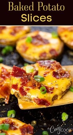 baked potato slices with bacon and green onions on a wooden spoon in front of them