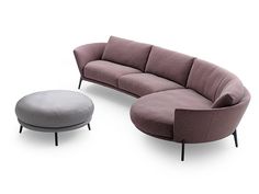 a couch, ottoman and footstool sitting next to each other on a white background