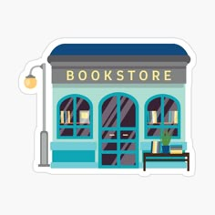 a book store sticker on the side of a white building with windows and a bench in front of it