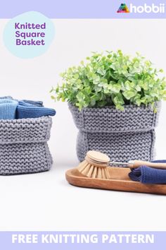 two knitted baskets with plants in them, one is blue and the other is gray