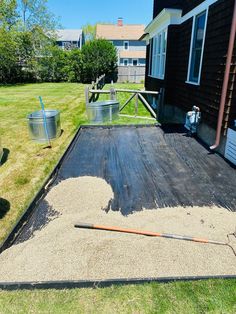 Preparing the area for stock tank garden with pea gravel, but first garden cloth to prevent weeds Garden With Pea Gravel, Galvanized Containers, Propagate Basil, Diy Stock Tank, Wood Stake, Plant Cages, First Garden