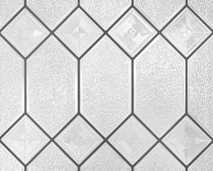 an image of a glass tile pattern that looks like hexagonals on the wall